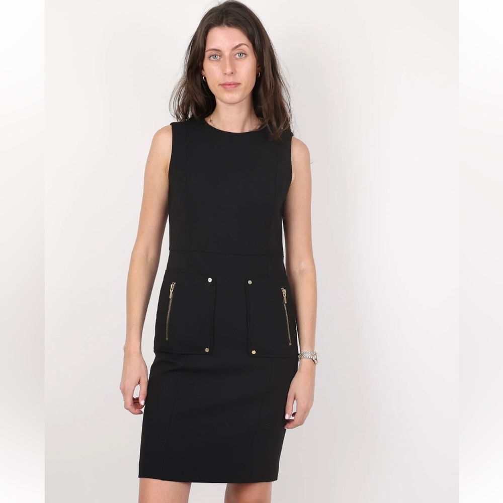 Tory Burch Black Dress with ‎ Zipper and TB medallions. Never worn. 390 retail